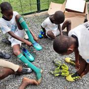 Children trying their new rugby boots